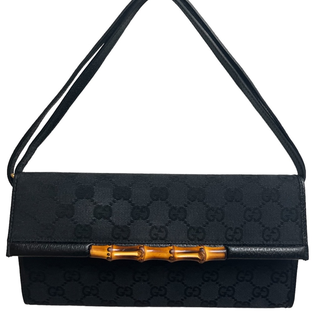 GUCCI black GG monogram canvas crossbody clutch.